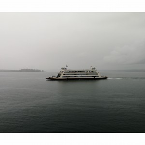 Ferry over foggy waters