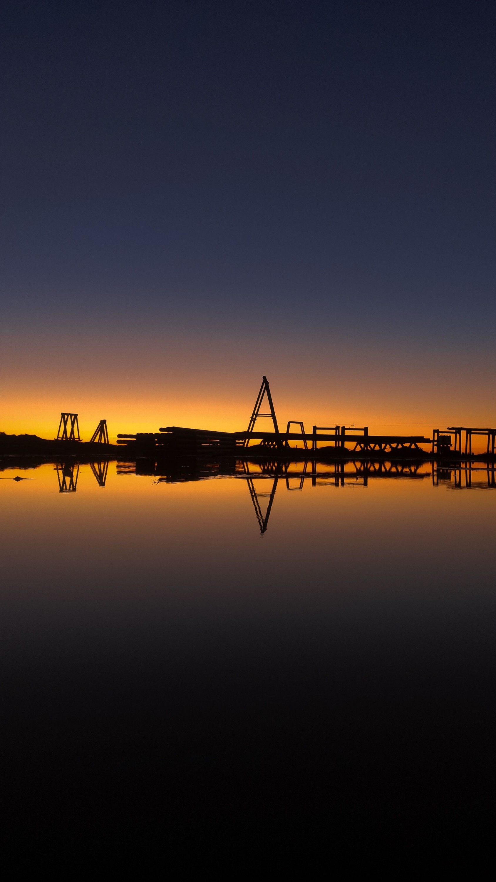 Sunset on oilfield