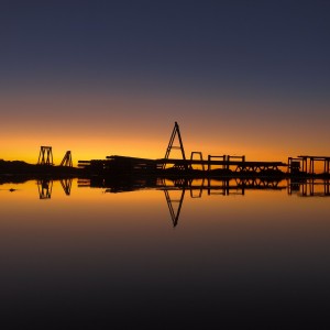 Sunset on oilfield